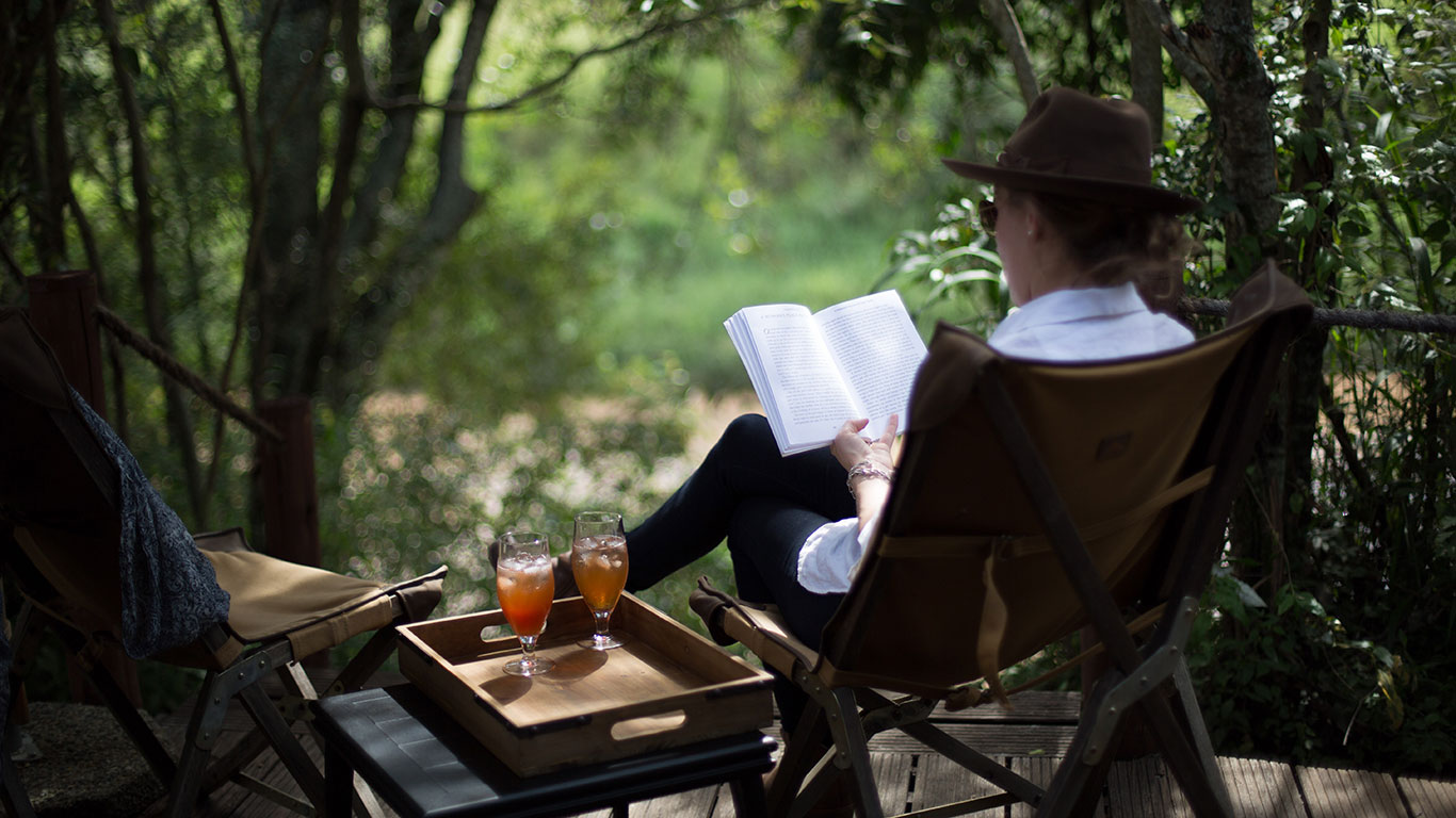 Sand River Masai Mara activities relaxing sundowners at camp overlooking river c Silverless 13