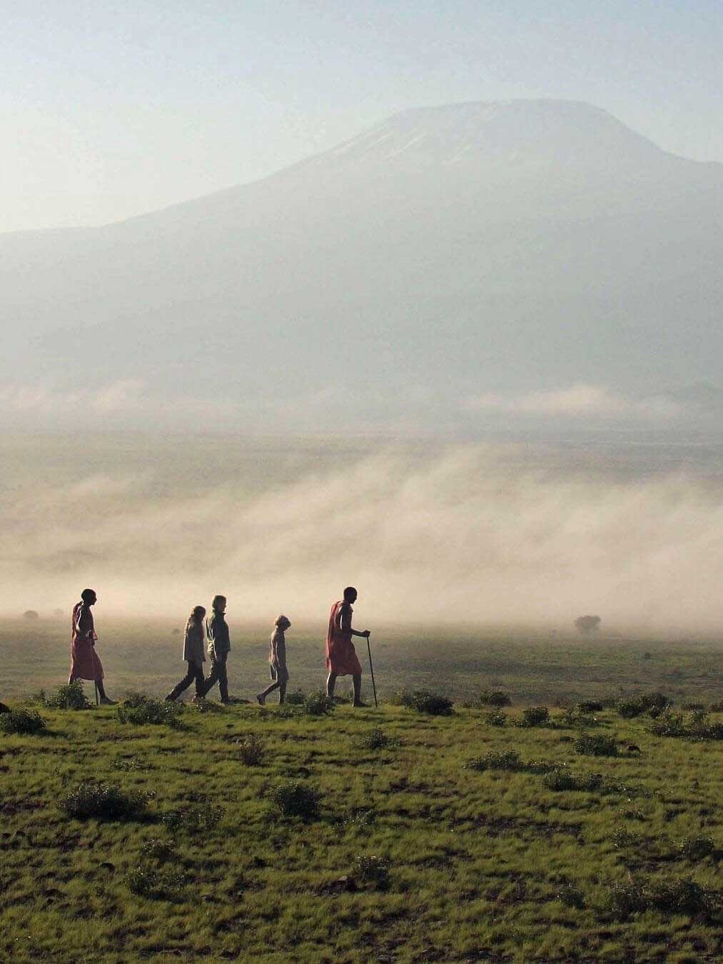 3-Africa-Courtesy-Elewana-Collection-Tortilis-Camp-activities-bush-walk-with-the-backdrop-of-Mt-Kilimanjaro-2-1200x6752x